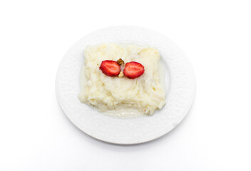 Traditional Ramadan Dessert Gullac. Turkey and made the month of Ramadan, light sweet milk. on white background