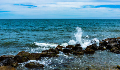 waves crashing on rocks