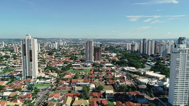 Aerial view of the city of Goi&acirc;nia, state of Goi&aacute;s, Brazil. City divided between an area full of buildings and others of residential houses. Concept of population growth increasing.