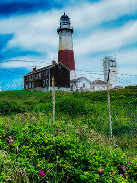 Montauk lighthouse behind barbed wire fence