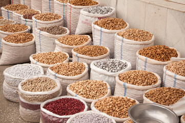 Bags full of nuts and beans at Siab Bazaar in Samarkand, Uzbekistan, selective focus