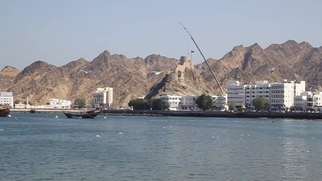 View of Mutrah Corniche with Mutrah Fort in Muscat, Oman