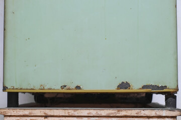 Edge door of the old refrigerator are rusty and decay close-up.