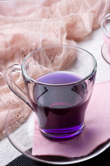 Thai blue, Butterfly pea tea on serving napkins with scarf. life style concept. close up