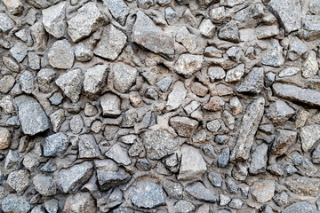 old stone wall of a residential building