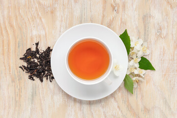 Tea with jasmine in a cup. Ceremony concept. Top view