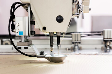 Fabric industry production line. Textile factory. Working tailoring process