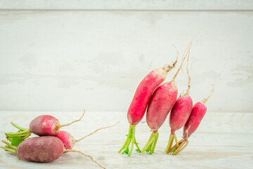 fresh radish on wooden background