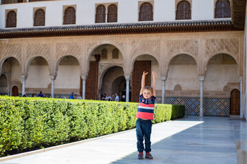 A child walks in the Alhambra.