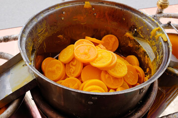 Round yellow Candles prepare for Boil to liquid and make merit with worship of Thai zodiac is a belief of Buddhists in the temple of Thailand