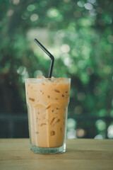 Close up iced espresso coffee in tall shaped glass