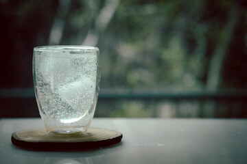 Tonic cocktail with ice in glass