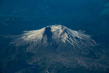 A view of Mount saint helens on a summer day from thirty five thousand feet.