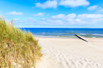 Beautiful white sand beach and blue sea near Kolobrzeg, Baltic Sea coast, Poland