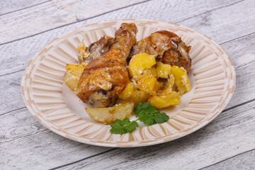 Roasted chicken legs with potato