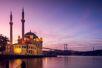 Fototapeta na wymiar Sunrise view Ortakoy Mosque and Bosphorus Bridge, Best touristic Place of Istanbul.