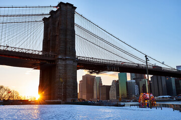 Bridge- Brooklyn- Sunset- Winter- Snow- New York City- Manhattan- United States- USA.