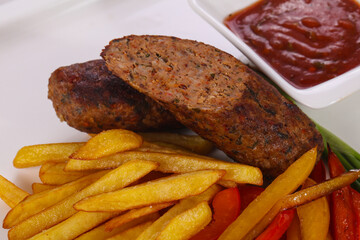 Roasted sausage with fried potato
