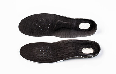 Orthopedic insoles for athletic shoes