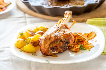baked turkey leg with potatoes