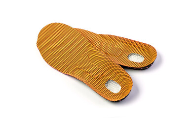 Orthopedic insoles for athletic shoes