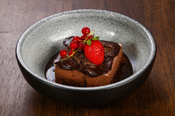 Sweet chocolate cake served strawberry