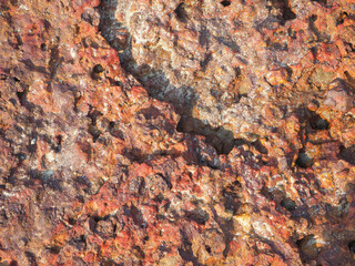 red lava rocks stones background, close up