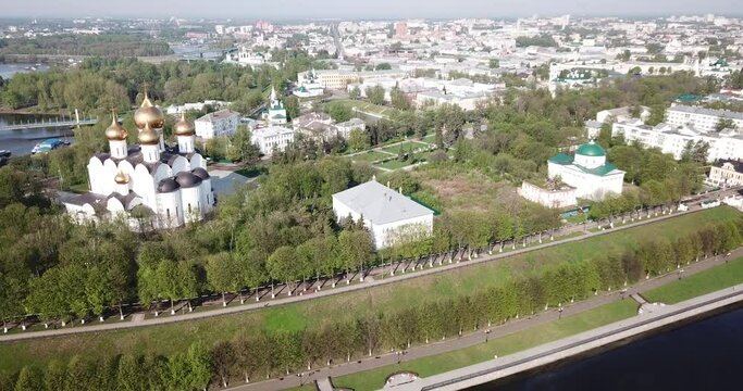 Scenic view from drone of Yaroslavl with park at Strelka in place of confluence of Kotorosl and Volga rivers and Assumption cathedral, Russia