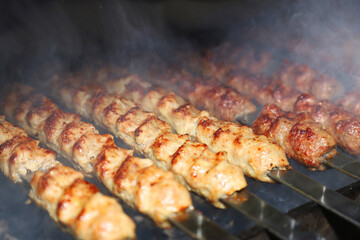 chef makes barbecue with smoke