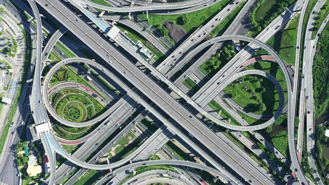 Top view and Zoom in of Bangkok Expressway intersection on day time.  Aerial view large interchange of Bangkok, Thailand 