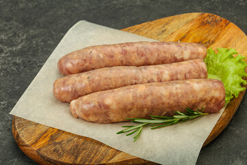 Raw pork meat sausages for grill