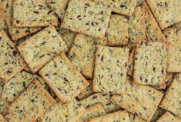 Cereal crackers Background.  Crispy breads with sesame and flax seeds,  macro