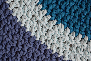 Round rug made of handmade knitted yarn.Crocheting.It will add warmth and comfort to the interior...