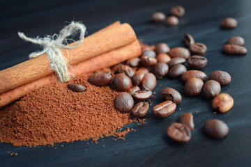 Coffee beans in an earthenware dish and a bag on a wooden table.