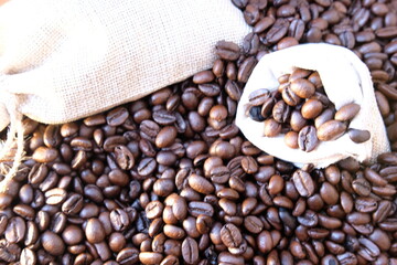 close up coffee beans and macro coffee beans on wood table background