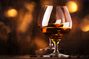Armagnac, French grape brandy, strong alcoholic drink. Still life in vintage style, selective focus