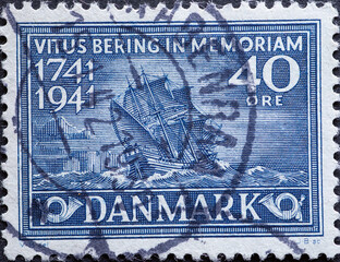 DENMARK - CIRCA 1941: A postage stamp from Denmark showing a historic sailing ship by Vitus Behring after the stranding on Bering Island