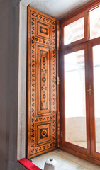 The mosque, built during the Ottoman period, ornamented window door