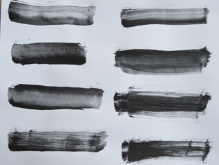 Black watercolor brush set for your design. Brush stroke and texture smear brush on a white background. My original hand drawing. 