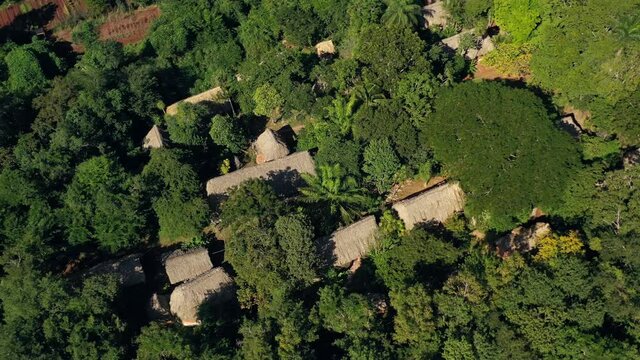 Aerial, drone shot panning over Mayan ruins, on the coast of Yucantan, on a sunny day, in Mexico