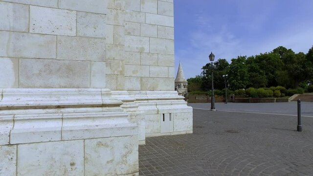 Matthias Church (Church of the Assumption of the Buda Castle) and the Fisherman's Bastion in Budapest Hungary, Europe during pandemic Covid-19. 4k Hand held