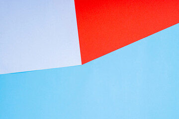 White, blue, red and pastel colorful texture background of fashion papers in memphis geometry style.