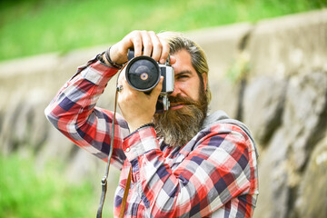 mature skilled camera man. paparazzi use digital camera. Photo shoot session. Handheld shooting. man photographer do shooting session. Shooting day hobby. Hobby and leisure. Enjoying summer
