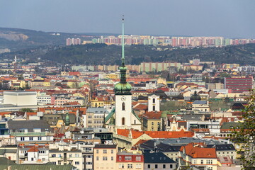 Aerial view of Brno with Church of St. James and Lisen panel housing estate in background, Moravia, Czech Republic, sunny day