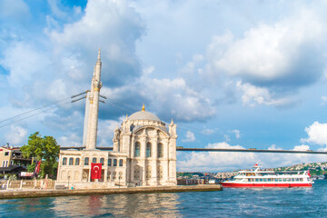 Fototapeta na wymiar Istanbul, Turkey / August 2019 Big Mecidiye mosque, popularly known as Ortaköy mosque, is a Neo Baroque style mosque located on the beach in Ortaköy,Besiktas district in the Bosphorus, Istanbul.