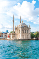 Fototapeta na wymiar Istanbul, Turkey / August 2019 Big Mecidiye mosque, popularly known as Ortaköy mosque, is a Neo Baroque style mosque located on the beach in Ortaköy,Besiktas district in the Bosphorus, Istanbul.