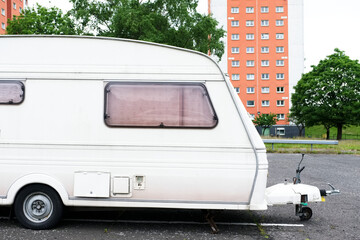 Caravan parked overnight public car park and council flats