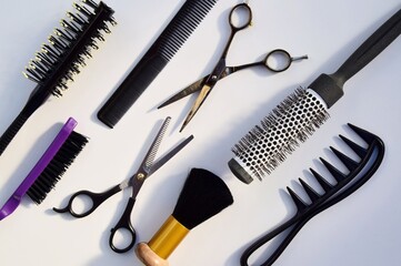 Hairdressing various accessories on a light background. concept of the hairdressing beauty industry