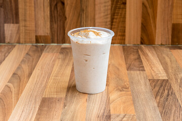 Venezuelan chicha in medium takeaway container