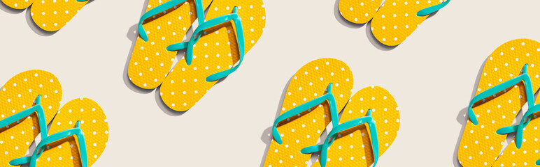 Summer concept with flip flops overhead view - flat lay